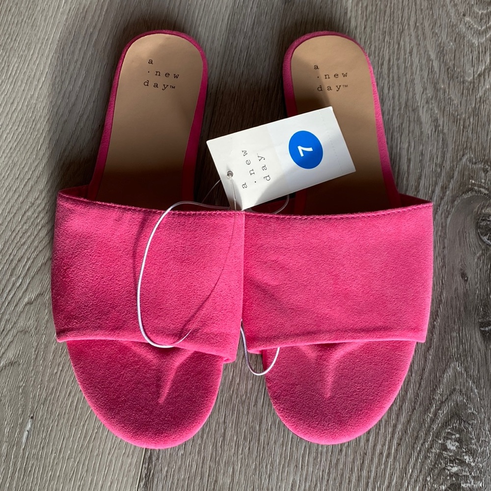 A new day. Size 7. Pink slip on shoes.
